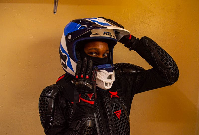 Motorcycle rider geared up on the open road